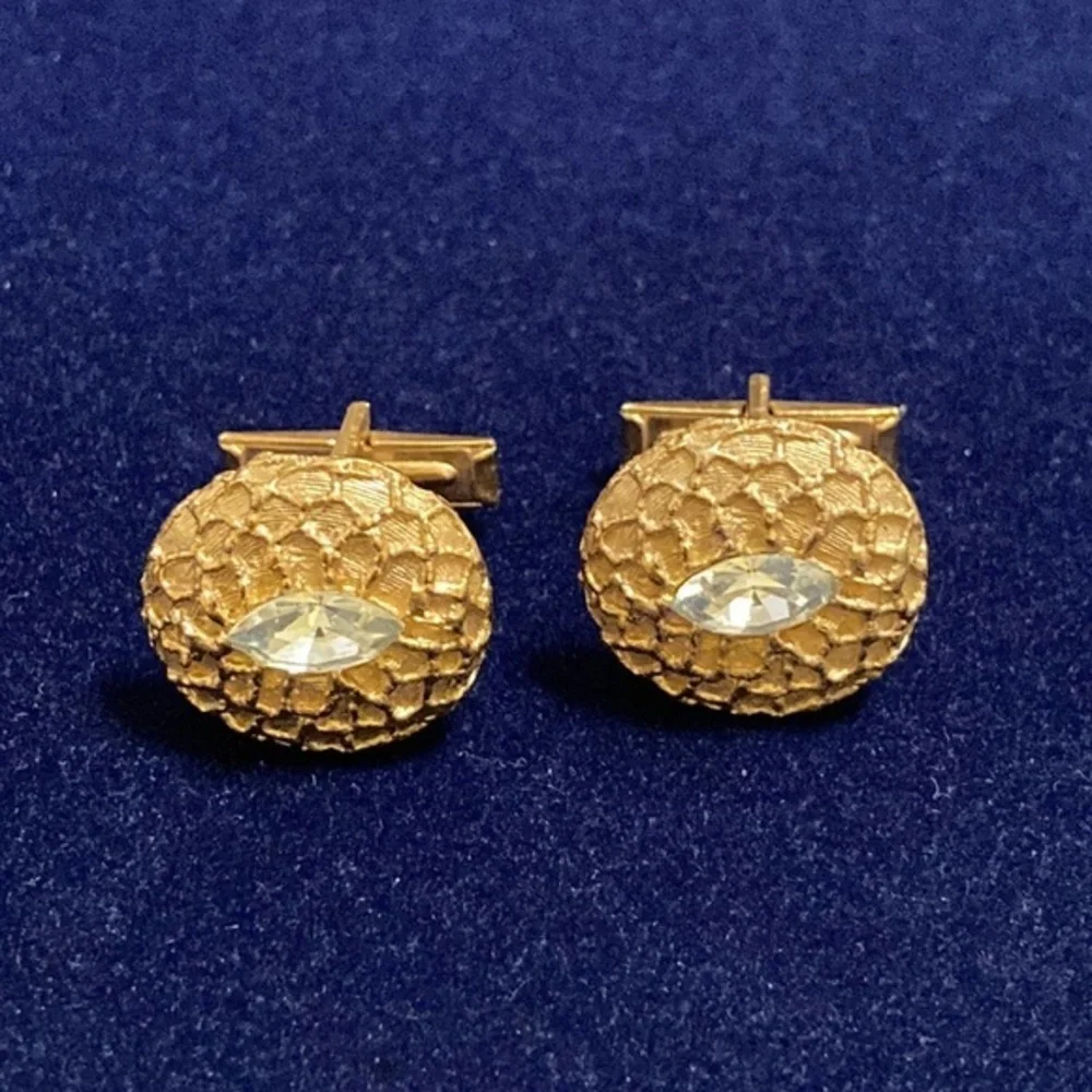 Men’s gold tone crusted round cufflinks with solitaire shaped white crystal